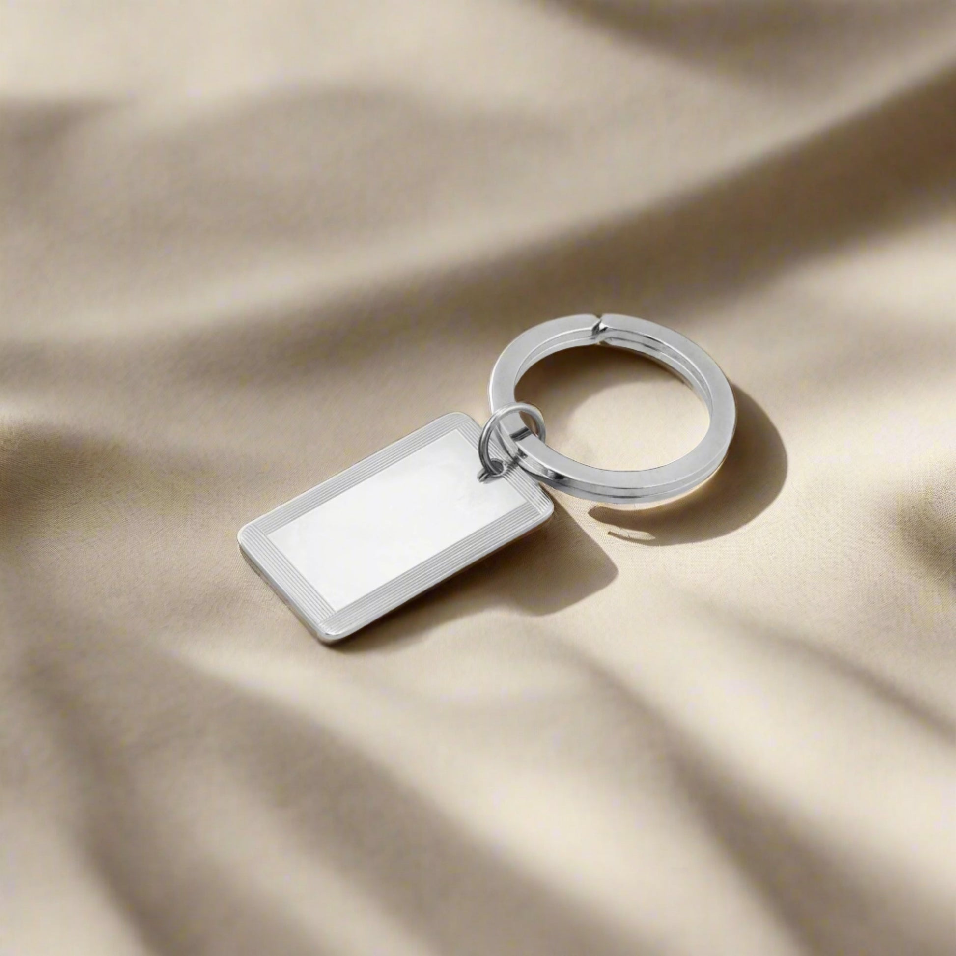 Sterling Silver Rectangular Key Ring with Four Line Frame